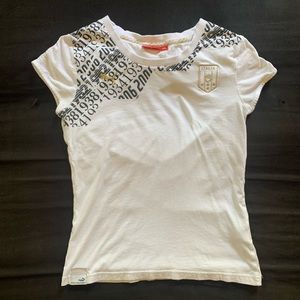 Puma’s Girls Italia Short Sleeve T-shirt “White, Black & Gold”